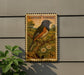 A postage stamp featuring a colorful Eastern Towhee bird perched on a branch, with a floral background.