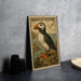 A framed illustration of a horned puffin bird, a type of seabird, is displayed on a wall.