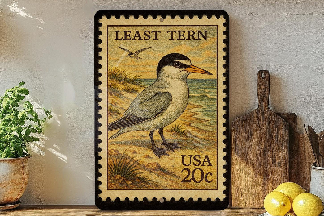 A framed postage stamp featuring a bird, likely a least tern, on a beach scene. The stamp is from the United States and has a value of 20 cents.