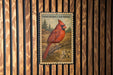 A postage stamp from the United States depicting a red cardinal bird perched on a branch.