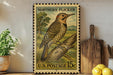 A vintage postage stamp featuring a Northern Flicker bird is displayed on a shelf, surrounded by kitchen utensils and a potted plant.