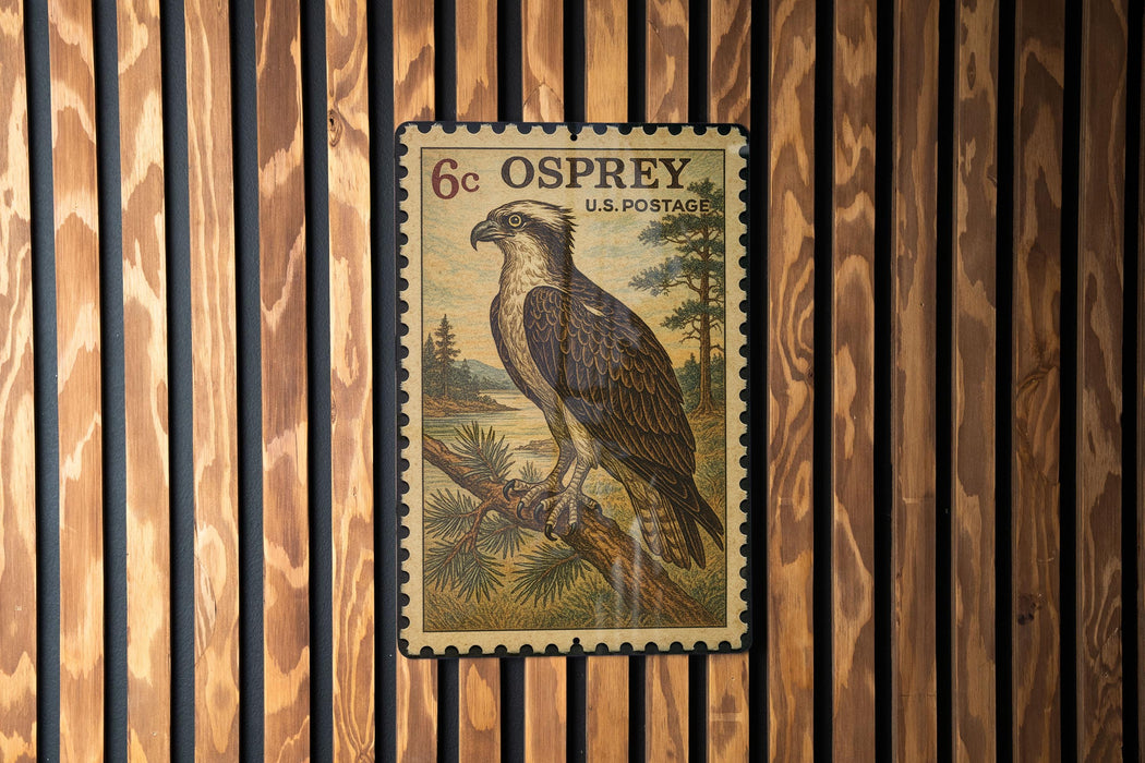 A U.S. postage stamp featuring an illustration of an Osprey, a large bird of prey, perched on a branch.