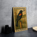 A framed postage stamp depicting a red-winged blackbird, with the text "RED-WINGED BLACKBIRD" and "8c" printed on it.