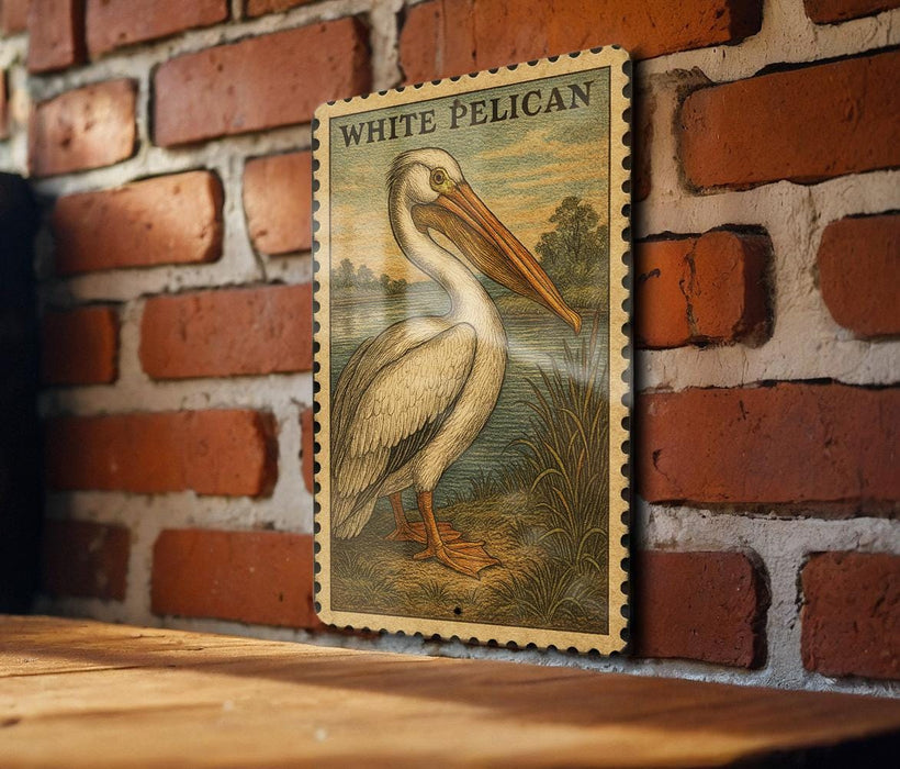 A vintage-style stamp depicting a pelican is hanging on a brick wall.
