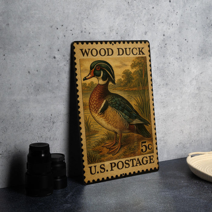 A vintage wood duck postage stamp from the U.S. Postal Service, featuring a detailed illustration of the duck in a natural setting.