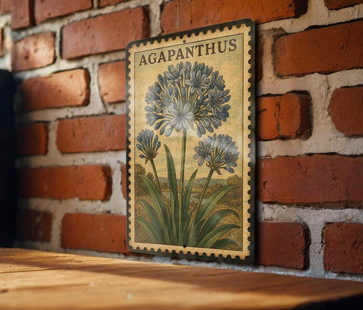 a vintage-style botanical illustration of a flower, specifically a lily, mounted on a brick wall.