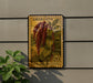 a stamp with a plant illustration and text, mounted on a wall next to a plant.