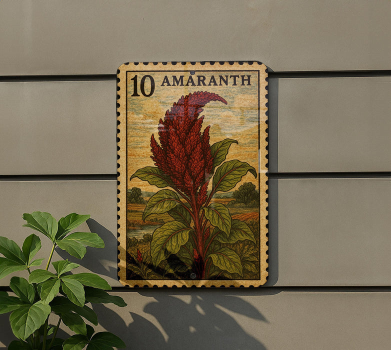 a stamp-like artwork depicting a red flower with green leaves, mounted on a wall.