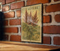 A vintage-style stamp featuring a plant illustration is displayed on a brick wall.