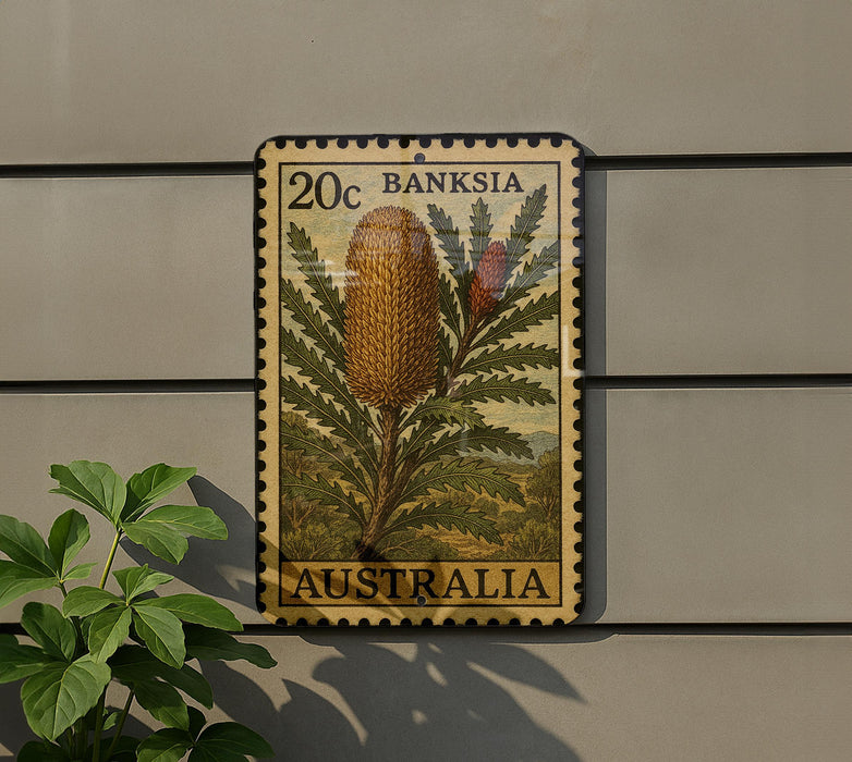 a 20c Australian postage stamp with a picture of a flower on it, mounted on a wall next to a plant.