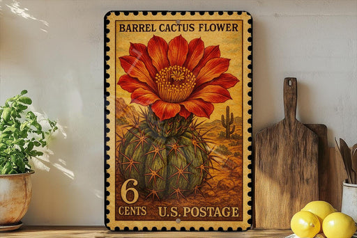 A framed image of a barrel cactus flower, with a vintage-style stamp on the back.