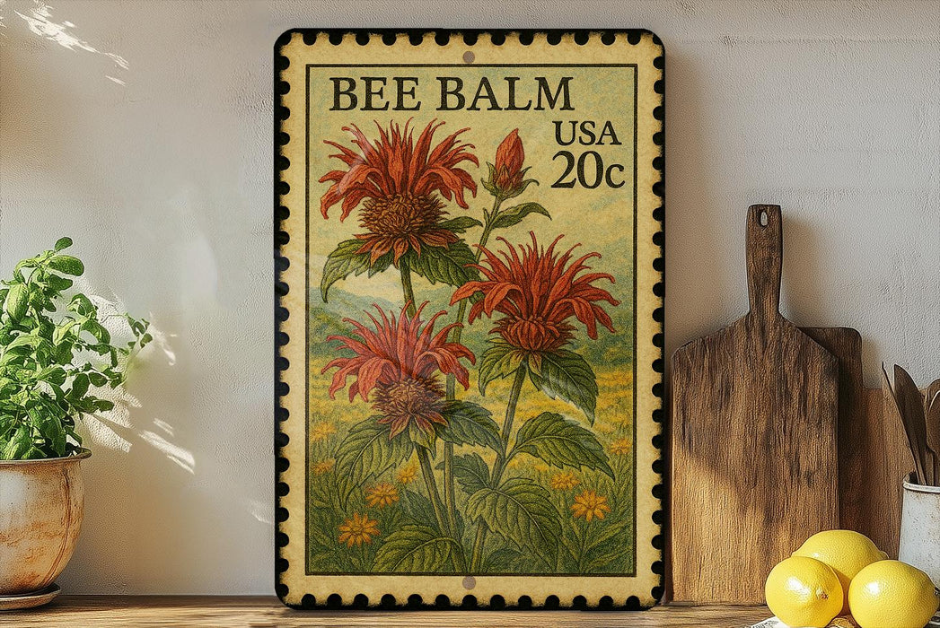 A framed vintage stamp depicting a red flower with green leaves, placed on a shelf next to a wooden cutting board and a potted plant.