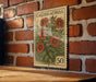 A vintage postage stamp featuring a floral design is displayed on a brick wall.