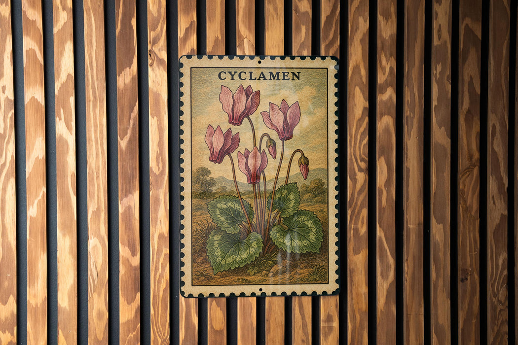 A vintage postage stamp featuring a floral illustration of pink flowers against a natural background.