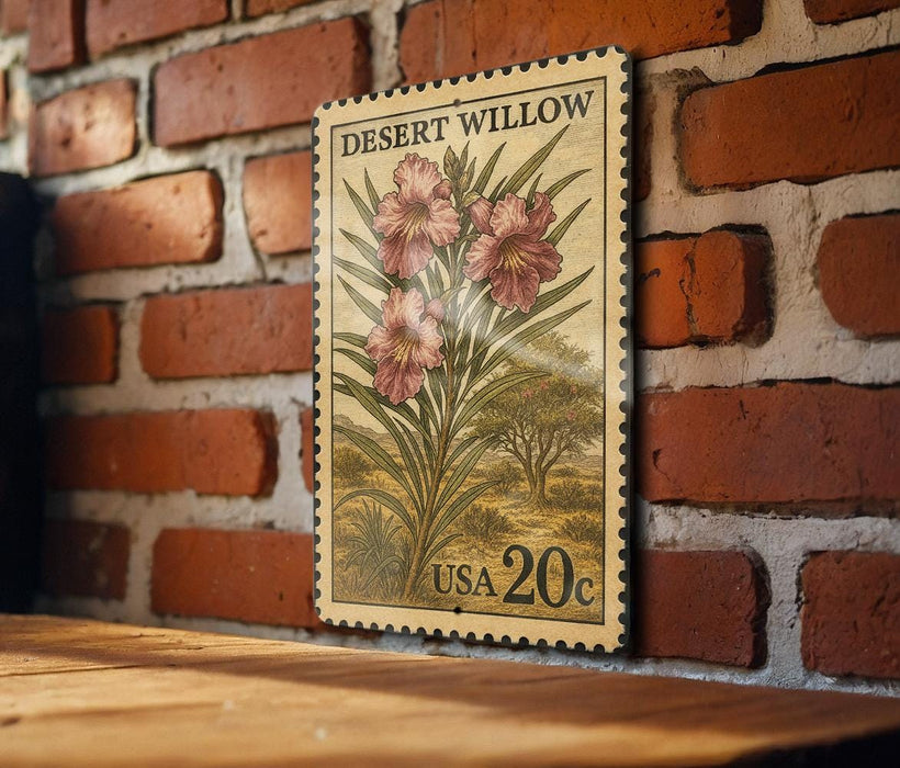 A vintage-style postage stamp from the United States, featuring a floral illustration of pink flowers on a brick wall.