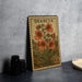 A metal stamp with a floral design and the text "DIASCIA 60c" is displayed on a table.
