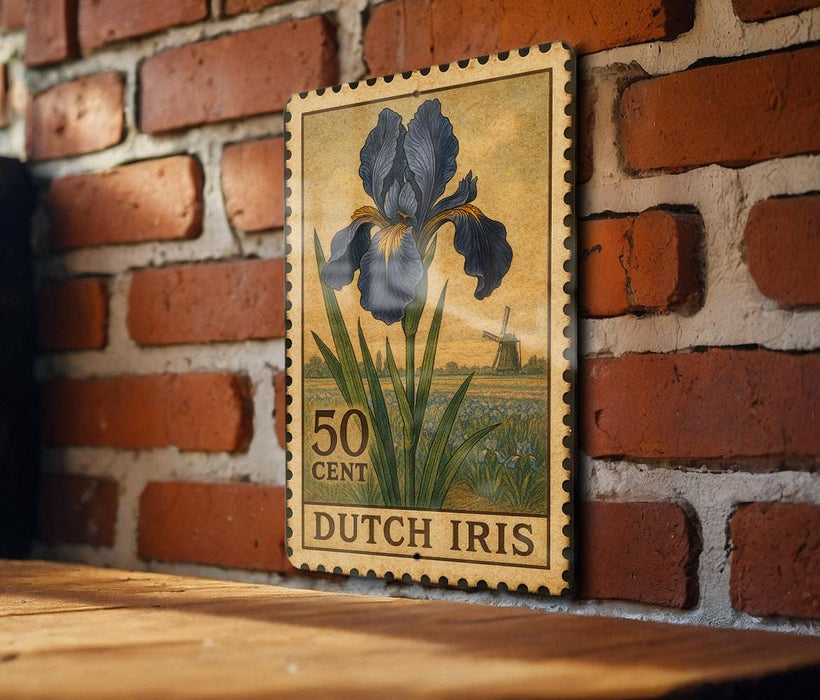 A 50 cent Dutch postage stamp featuring an illustration of a blue iris flower is displayed on a brick wall.