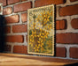 A vintage-style postage stamp featuring a floral illustration is displayed on a brick wall.