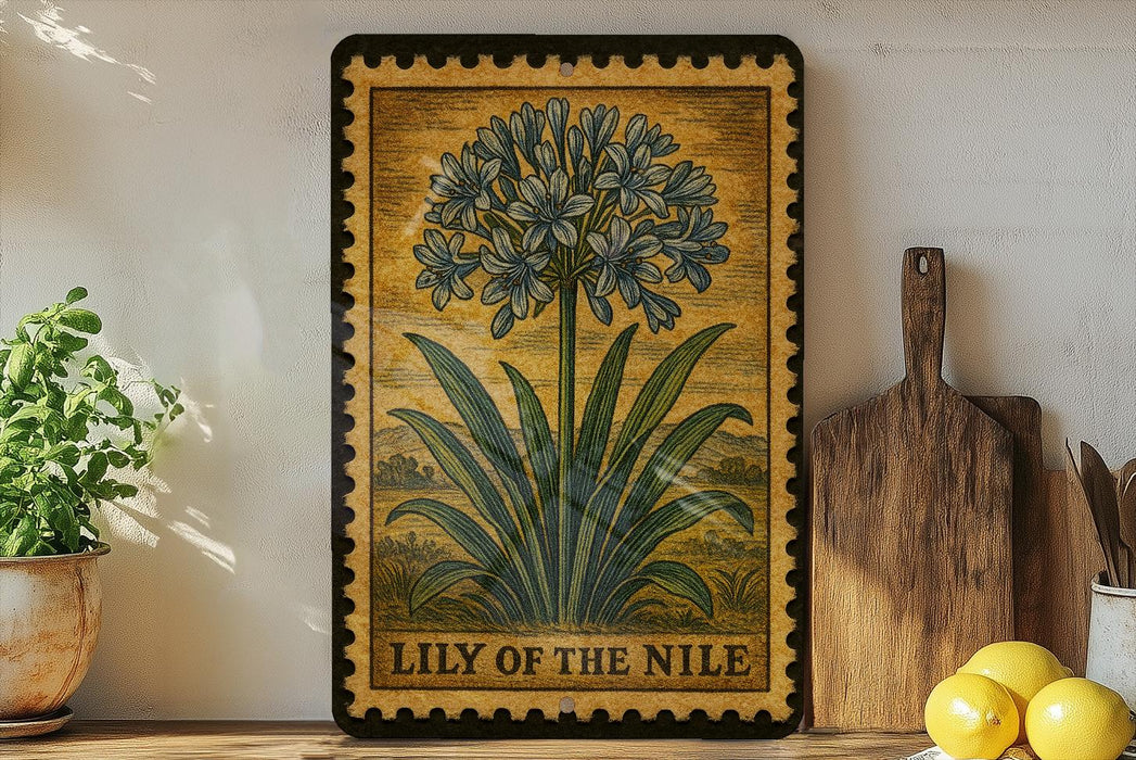 A framed illustration of a lily of the Nile flower is displayed on a shelf, accompanied by a wooden cutting board, a potted plant, and some lemons.