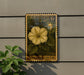 A U.S. postage stamp featuring a yellow flower, mounted on a wall next to a plant.