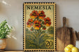 A vintage-style postage stamp featuring a vibrant illustration of orange and yellow flowers, placed on a wooden surface next to a wooden cutting board and a potted plant.