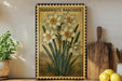 A framed illustration of a daffodil plant is displayed on a shelf, accompanied by a wooden cutting board and a potted plant.