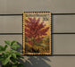 A 20c postage stamp from the United States, featuring a redbud tree on the front.