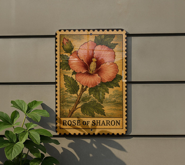 A wooden sign with a floral illustration and the text "ROSE of SHARON" is displayed on a wall, accompanied by a small green plant.