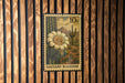 A 10 cent postage stamp from Saguaro, featuring a cactus flower and mountains in the background.