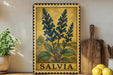 A framed illustration of blue flowers is displayed on a shelf, accompanied by a wooden cutting board, a potted plant, and some lemons.