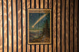 A vintage-style postage stamp depicting a shooting star against a night sky with a landscape in the background.