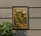 A framed postage stamp from the United States, featuring an illustration of a plant with red berries and green leaves.