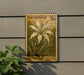 A U.S. postage stamp featuring a white spider lily plant is displayed on a wall, with a small green plant to the left.
