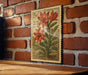 A 5c stamp featuring a red flower and green leaves, mounted on a brick wall.