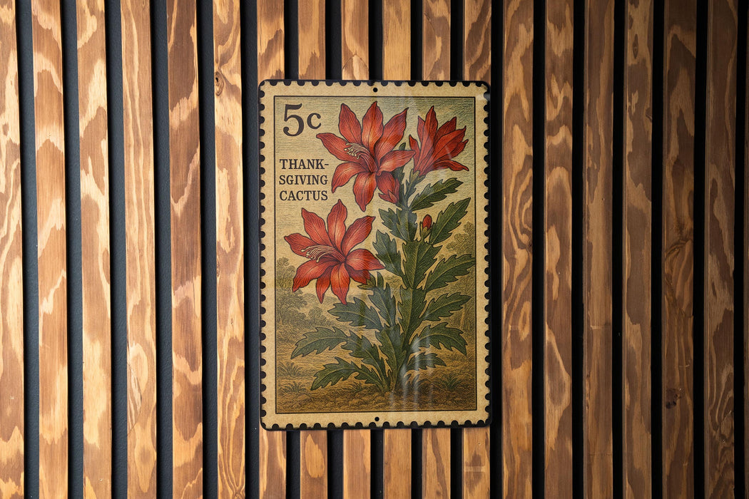 A 5c postage stamp featuring a red flower and green leaves, mounted on a wooden wall.