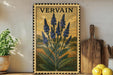 a framed illustration of blue flowers on a shelf, with a wooden cutting board and a potted plant to the left.