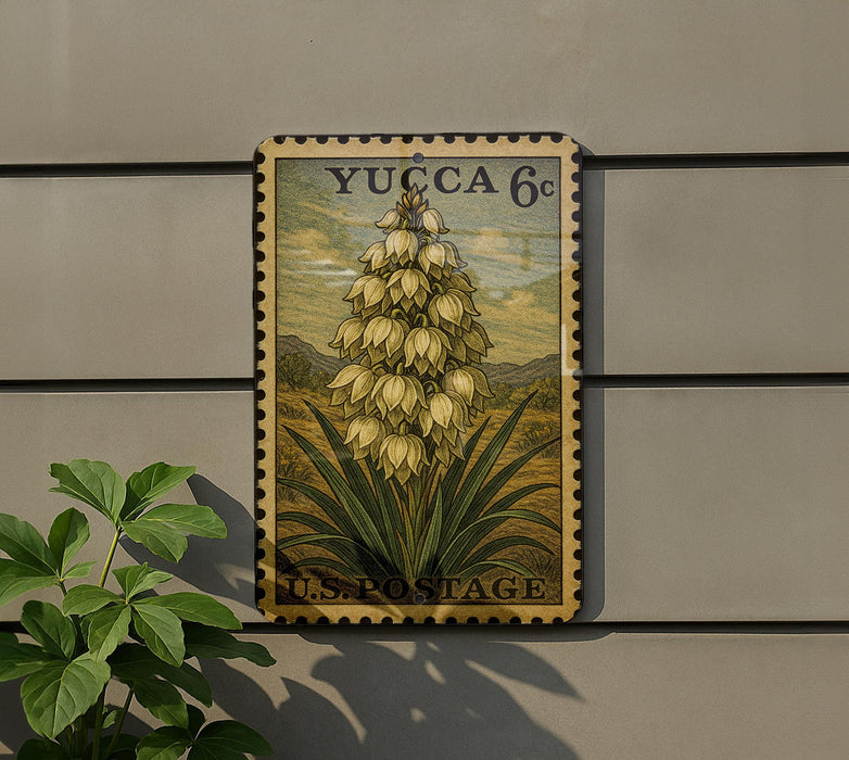 A postage stamp featuring a detailed illustration of a tall flower with yellow petals, set against a landscape background.
