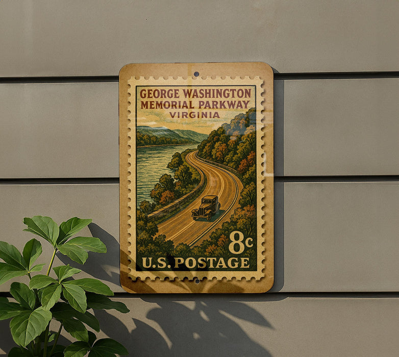 A vintage postage stamp depicting a scenic road winding through a forested area, with a car traveling along the road.