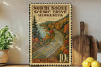 A vintage postage stamp depicting a scenic drive through North Shore, Minnesota, with a road winding through a forested area and a lake in the background.