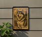 a framed picture of an Alaskan Malamute dog, with the text "Alaskan Malamute" below the image.