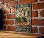 A vintage-style metal sign with the text "CAPTAIN JOHN SMITH CHESAPEAKE NATIONAL HISTORIC TRAIL VIRGINIA" is displayed on a brick wall.