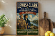 A vintage-style metal sign for the Lewis & Clark National Historic Trail in Illinois, featuring two men in period clothing and a scenic illustration of the trail.