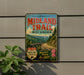 a vintage-style sign for the Midland Trail in West Virginia, with a scenic mountain landscape and a winding road.