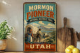 A vintage-style poster for the Mormon Pioneer National Historic Trail in Utah, featuring a wagon train and a scenic landscape.