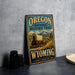 A vintage-style sign for the Oregon National Historic Trail, featuring a wagon traveling through a scenic landscape with mountains in the background.