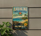 A vintage-style metal sign for the Ahukini Recreation Area in Hawaii, featuring a tropical beach scene with a turtle, palm trees, and a hibiscus flower.