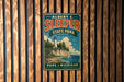 A vintage-style metal sign for Albert E. Sleeper State Park in Michigan, featuring a lighthouse and a scenic landscape.
