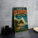 A vintage-style metal sign for Albert E. Sleeper State Park in Michigan, featuring a lighthouse and a coastal landscape.