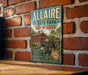 A vintage-style metal sign for Allaire State Park in New Jersey, featuring a red brick wall and a wooden table in the foreground.