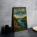 A vintage-style metal sign for AllergNY State Park in New York, featuring a scenic landscape with a river, bridge, and trees.